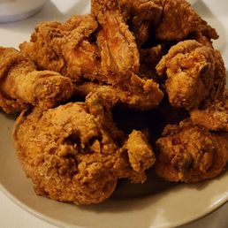 Mrs. Wilkes Dining Room signature dishes Fried Chicken, Biscuits, Sweet Potato Soufflé, Banana Pudding